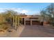 Single-story home with two-car garage and desert landscaping at 29991 N 78Th Pl, Scottsdale, AZ 85266