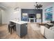 Open concept kitchen boasts a large island and wine refrigerator at 29991 N 78Th Pl, Scottsdale, AZ 85266