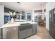 Spacious kitchen with a large island and farmhouse sink at 29991 N 78Th Pl, Scottsdale, AZ 85266
