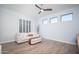 Relaxing living room with light walls and wood floors at 29991 N 78Th Pl, Scottsdale, AZ 85266