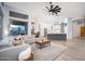 Open concept living room with hardwood floors and views of the kitchen at 29991 N 78Th Pl, Scottsdale, AZ 85266
