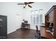 Home office with built-in desk and ample storage at 29991 N 78Th Pl, Scottsdale, AZ 85266