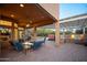Covered patio features an outdoor kitchen and seating area at 29991 N 78Th Pl, Scottsdale, AZ 85266