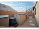 Backyard storage area with multiple sheds and bins at 29991 N 78Th Pl, Scottsdale, AZ 85266