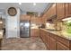 Modern kitchen with granite countertops, stainless steel appliances, and ample cabinetry at 40916 N Harbour Town Way, New River, AZ 85087