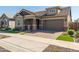 Single-story home with stone accents and a two-car garage at 4283 E Bernice St, Gilbert, AZ 85295