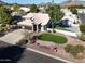 Two-story house with a large backyard, pool, and putting green at 4530 W Misty Willow Ln, Glendale, AZ 85310