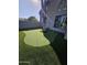 Artificial turf putting green in backyard, next to a large tree at 4530 W Misty Willow Ln, Glendale, AZ 85310
