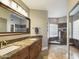 Elegant bathroom with double vanity and walk-in shower at 4530 W Misty Willow Ln, Glendale, AZ 85310