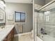 Updated bathroom with vanity and glass shower door at 4530 W Misty Willow Ln, Glendale, AZ 85310