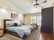 Primary bedroom with large bed and built-in shelving at 4530 W Misty Willow Ln, Glendale, AZ 85310