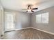 Bedroom with wood-look floors and ceiling fan at 4530 W Misty Willow Ln, Glendale, AZ 85310