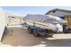 Covered boat on trailer in driveway at 4530 W Misty Willow Ln, Glendale, AZ 85310