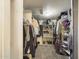 Large walk-in closet with shelving and hanging rods at 4530 W Misty Willow Ln, Glendale, AZ 85310
