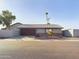 Single-story home with attached garage and stone accents at 4530 W Misty Willow Ln, Glendale, AZ 85310