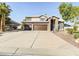 Two-story home with three-car garage and basketball hoop at 4530 W Misty Willow Ln, Glendale, AZ 85310