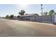 Single-story home with gated entry and desert landscaping at 4530 W Misty Willow Ln, Glendale, AZ 85310