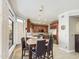 Kitchen with corner breakfast nook and stainless steel appliances at 4530 W Misty Willow Ln, Glendale, AZ 85310