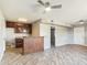 Living room with wood-look floors and built in bar at 4530 W Misty Willow Ln, Glendale, AZ 85310