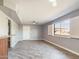 Living room with wood-look floors and view to backyard at 4530 W Misty Willow Ln, Glendale, AZ 85310