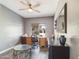 Home office with desk, chair, and plenty of natural light at 4530 W Misty Willow Ln, Glendale, AZ 85310
