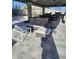 Relaxing patio furniture under covered patio with a built-in grill at 4530 W Misty Willow Ln, Glendale, AZ 85310