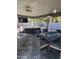 Large covered patio with seating and dining areas at 4530 W Misty Willow Ln, Glendale, AZ 85310