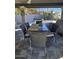 Patio dining set for six under covered patio at 4530 W Misty Willow Ln, Glendale, AZ 85310