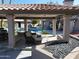 Covered patio overlooking the pool and backyard at 4530 W Misty Willow Ln, Glendale, AZ 85310