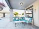 Covered patio with comfortable seating and a view of the backyard at 4530 W Misty Willow Ln, Glendale, AZ 85310