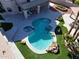 Relaxing kidney-shaped pool and spa with plenty of patio space at 4530 W Misty Willow Ln, Glendale, AZ 85310