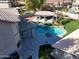 Inviting pool and spa area with large patio and pergola at 4530 W Misty Willow Ln, Glendale, AZ 85310