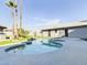 Inviting kidney-shaped pool with a spa and ample patio space at 4530 W Misty Willow Ln, Glendale, AZ 85310