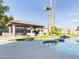 Relaxing pool area with a covered patio and built-in grill at 4530 W Misty Willow Ln, Glendale, AZ 85310