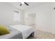 Comfortable bedroom featuring neutral walls and tiled floors at 4602 N 47Th Ave, Phoenix, AZ 85031