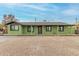 Charming single-story home with a covered entry and a well-maintained gravel yard at 4602 N 47Th Ave, Phoenix, AZ 85031