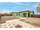 Charming home featuring unique color scheme, a small front yard, and block wall in backyard at 4602 N 47Th Ave, Phoenix, AZ 85031