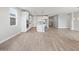 Bright open kitchen with a center island, tile floors, and stainless steel appliances at 4816 N 177Th Ln, Goodyear, AZ 85395