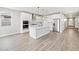 Modern kitchen with a center island, stainless steel appliances, and tile floors at 4816 N 177Th Ln, Goodyear, AZ 85395