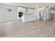 Bright, open kitchen featuring a large island, stainless steel appliances, and modern light fixtures at 4816 N 177Th Ln, Goodyear, AZ 85395