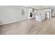 Open kitchen with stainless appliances, center island, and modern cabinetry at 4816 N 177Th Ln, Goodyear, AZ 85395