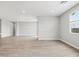 Large and bright open floor plan showcasing tile floors at 4816 N 177Th Ln, Goodyear, AZ 85395