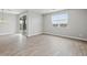 Well-lit room with tile floors and modern sliding glass door access at 4816 N 177Th Ln, Goodyear, AZ 85395