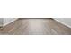 Close-up of the home's tile flooring, highlighting its wood-look texture at 4816 N 177Th Ln, Goodyear, AZ 85395