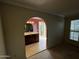 Bathroom with vanity, tile flooring and access to backyard at 5003 W Mescal St, Glendale, AZ 85304