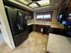 Well-equipped kitchen featuring stainless steel refrigerator and stove at 5003 W Mescal St, Glendale, AZ 85304