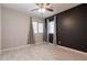 Comfortable bedroom with neutral walls and wood-look floors at 5231 E Red Bird Ln, San Tan Valley, AZ 85140