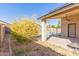 Covered patio, fire pit, and pool at 5426 N Rattler Way, Litchfield Park, AZ 85340