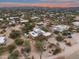 Luxury home with solar panels and a pool, aerial view at 6521 E Ashler Hills Dr, Cave Creek, AZ 85331