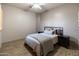 Bedroom with wood flooring and ceiling fan at 6521 E Ashler Hills Dr, Cave Creek, AZ 85331